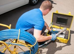 James is getting ready for a drain cleaning job